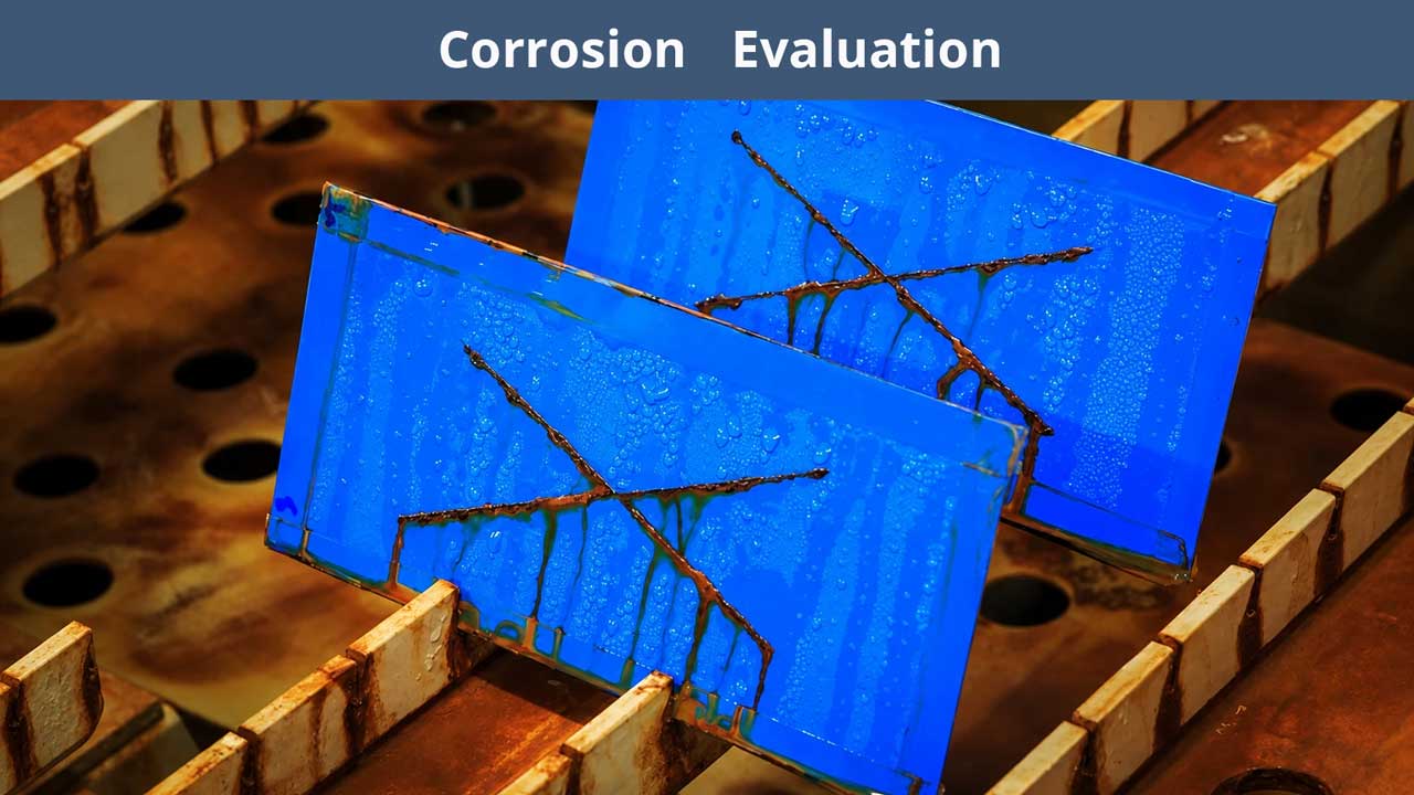 Blue test panels showing corrosion evaluation results after exposure to salt spray testing.